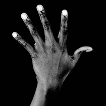 black hands white